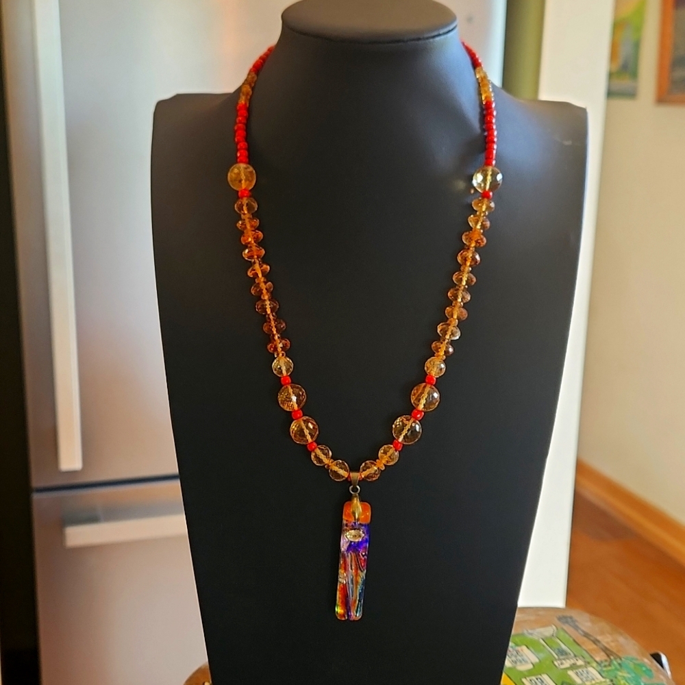 Artisan mix up in Resin and Citrine. 20" with 2" pendant drop.
